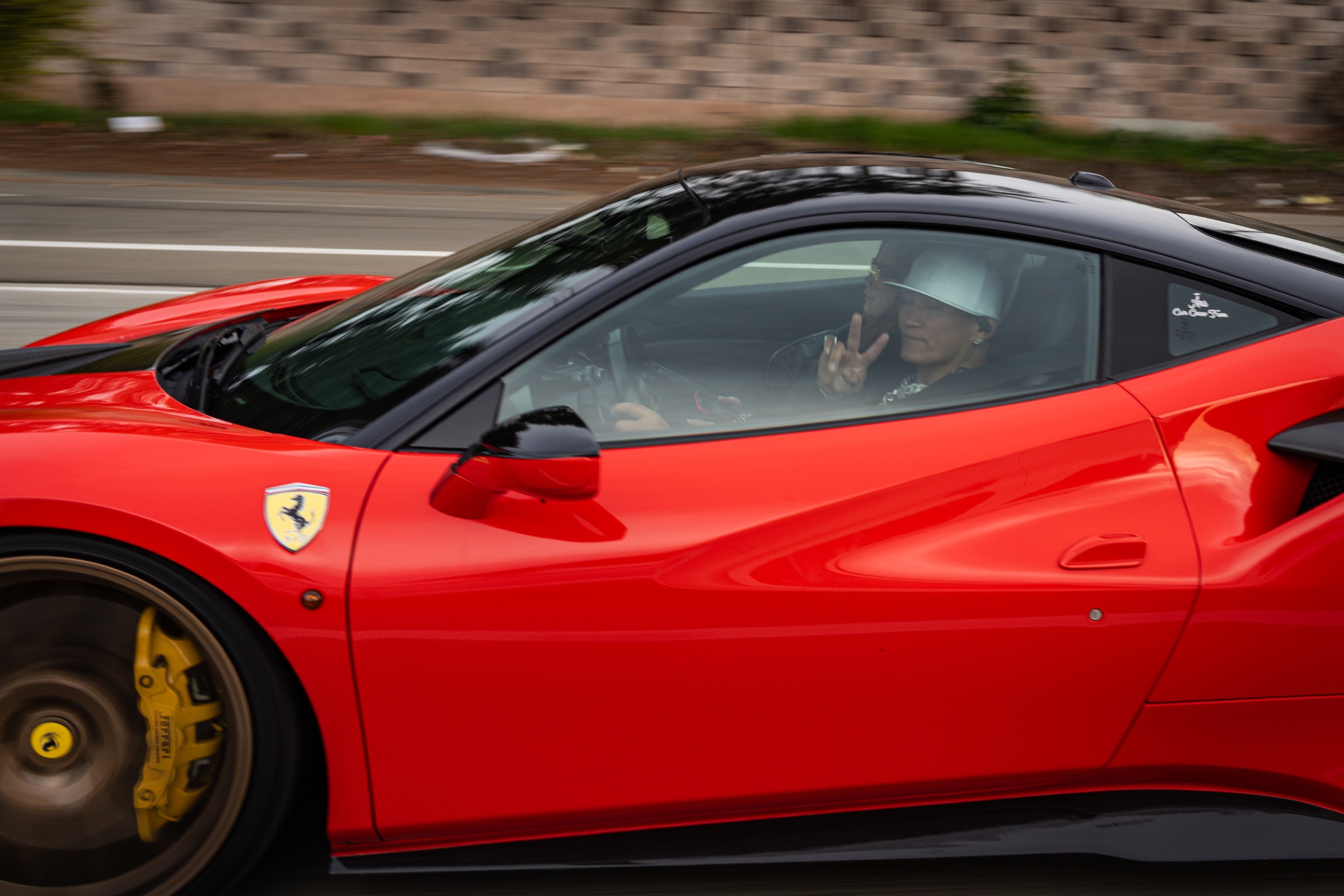 Red Ferrari 488 rolling